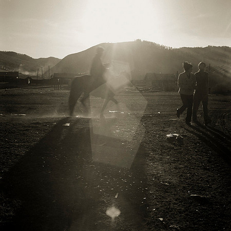 Light reflecting off broken Vodka Bottles