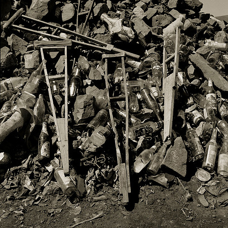 Abandoned crutches as offerings on a pagan shrine or Ovoo
